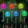 TomCare Solar Flickering Flame Torches Waterproof Outdoor Lights 4 Pack 3